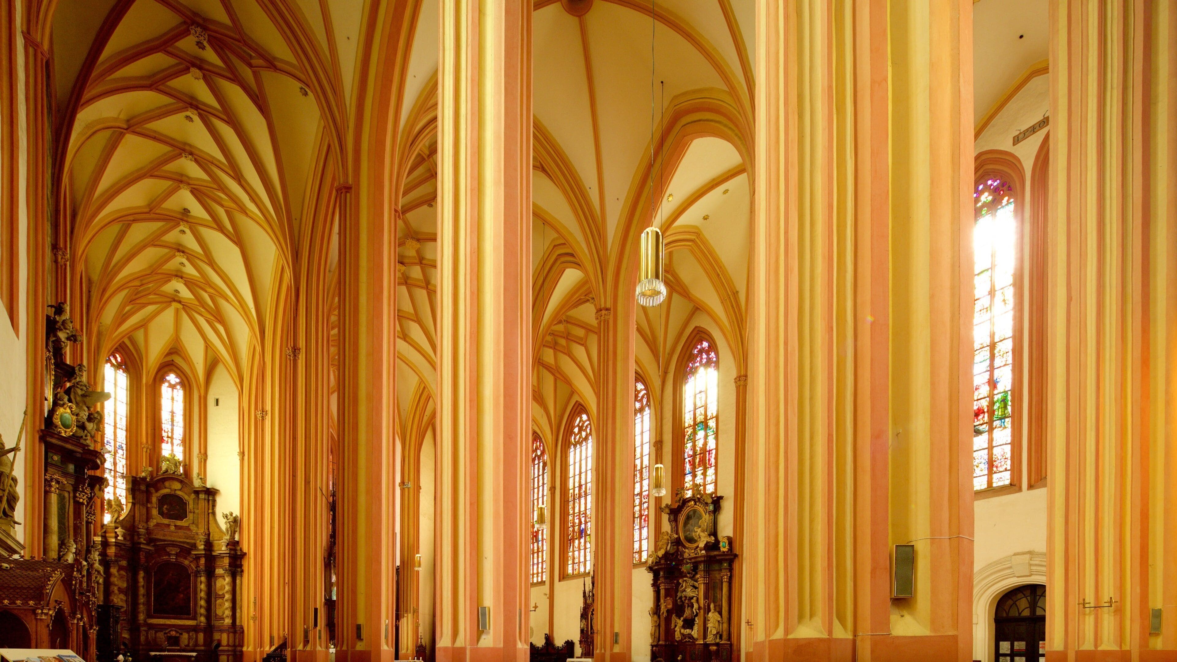 St. Moritz Church which includes a church or cathedral, heritage elements and interior views