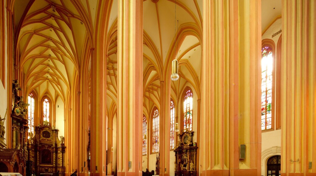 St. Moritz Church which includes a church or cathedral, heritage elements and interior views