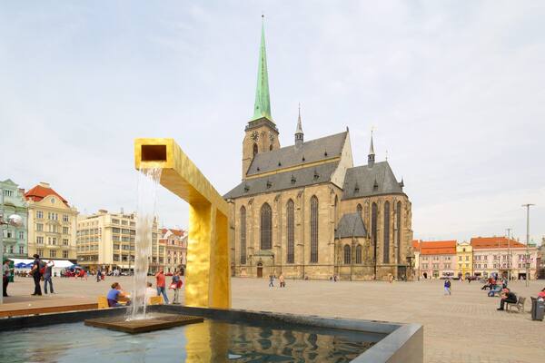 St. Bartholomew\'s Cathedral showing a square or plaza, a city and a church or cathedral