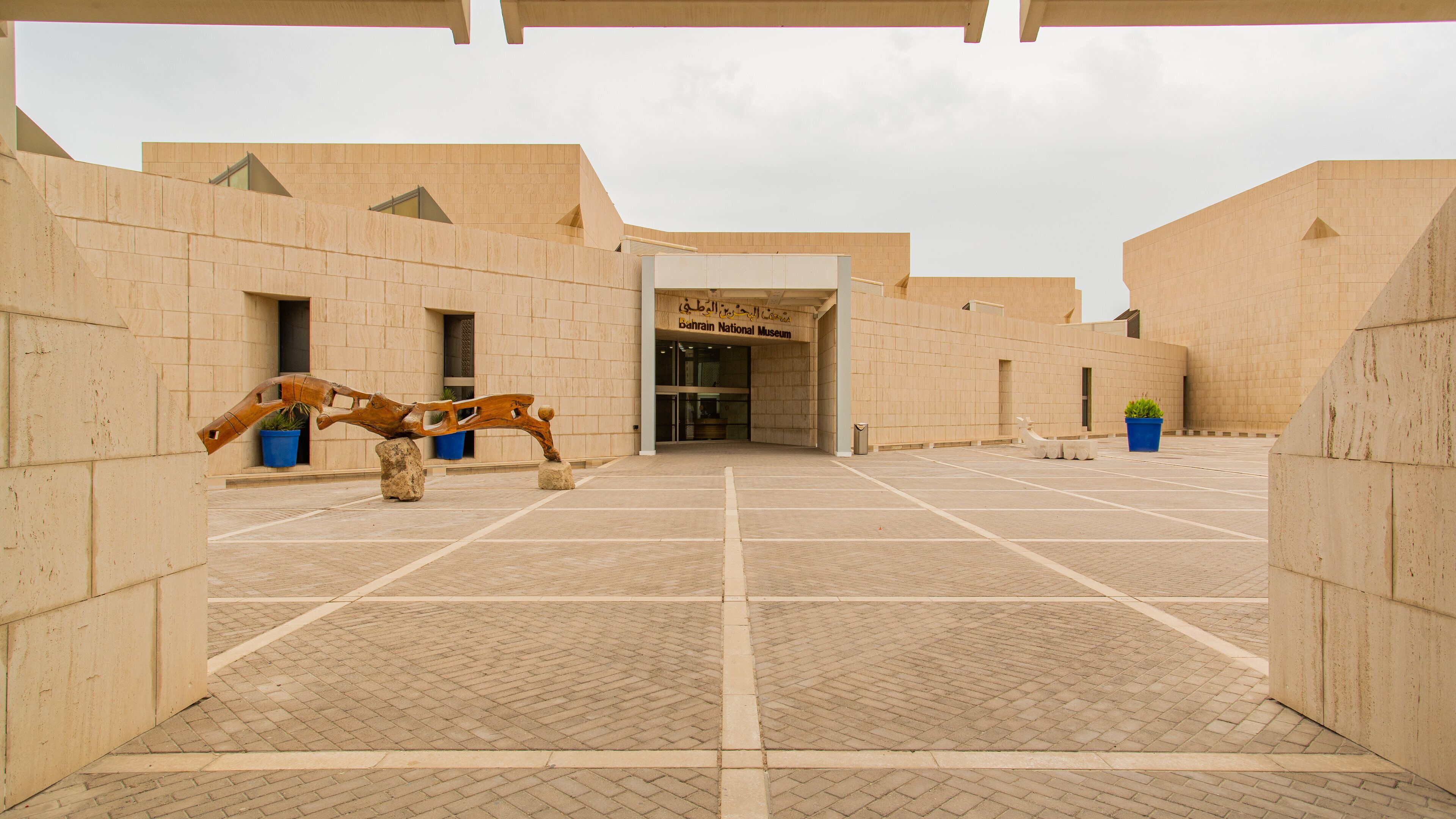 Bahrain National Museum featuring outdoor art and a square or plaza