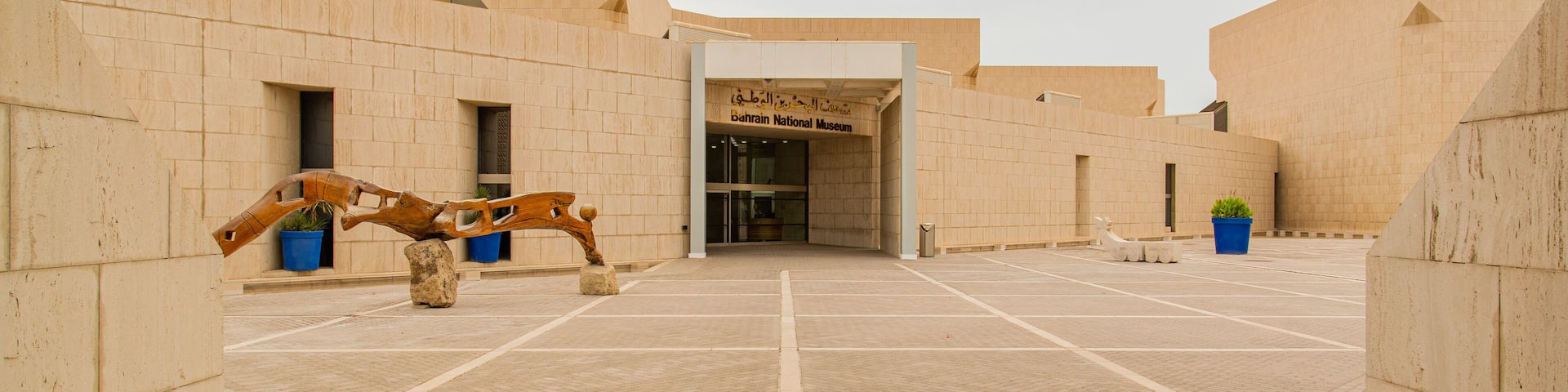 Bahrain National Museum featuring outdoor art and a square or plaza
