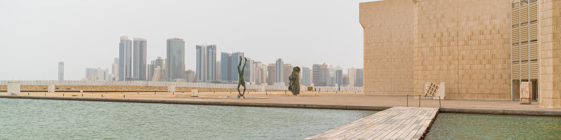 Bahrain National Museum featuring a bay or harbor and a city