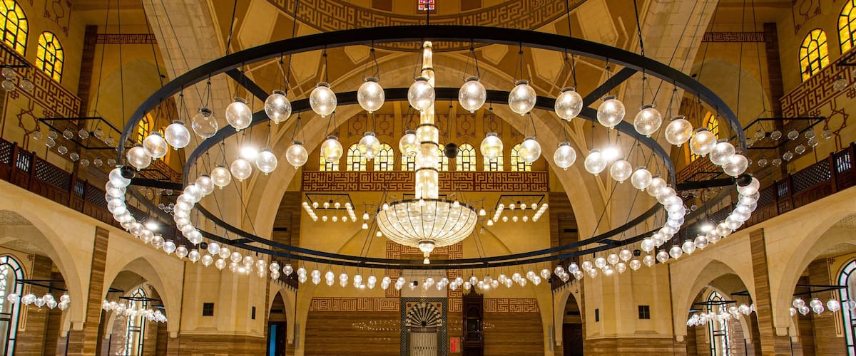 Al Fateh Grand Mosque featuring heritage elements, a mosque and interior views