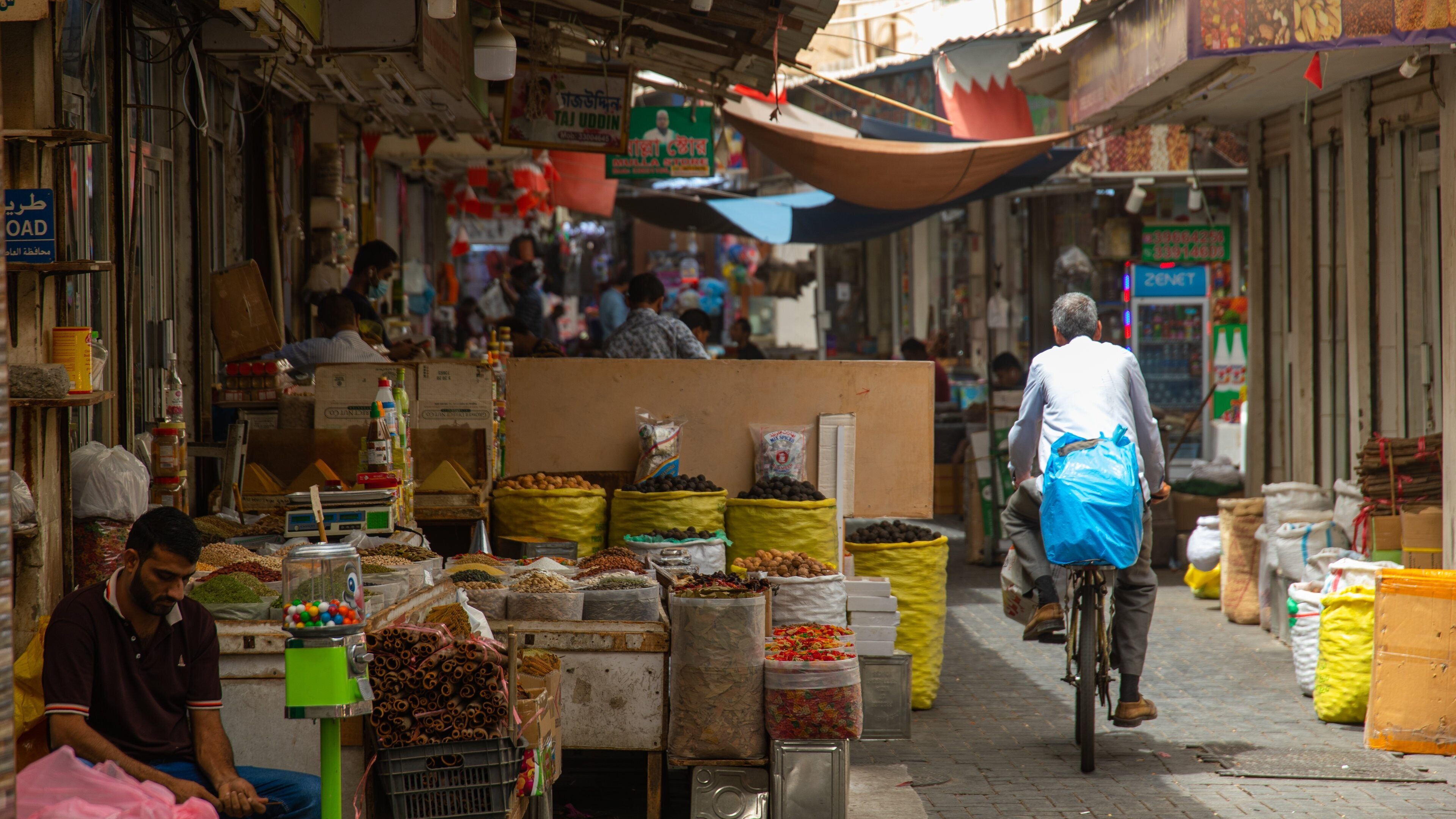 Bab Al Bahrain showing cycling and markets