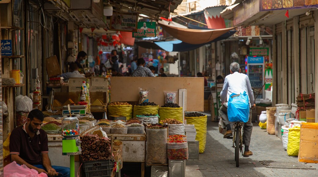 Bab Al Bahrain showing cycling and markets
