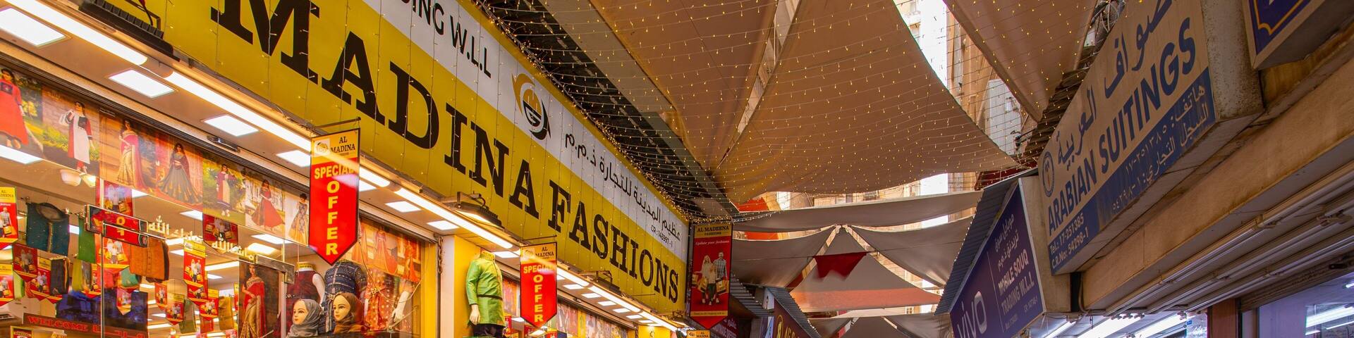 Bab Al Bahrain which includes street scenes and markets