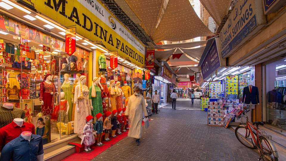 Bab Al Bahrain which includes street scenes and markets