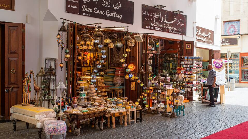 A shop with colorful lanterns and various items on display.