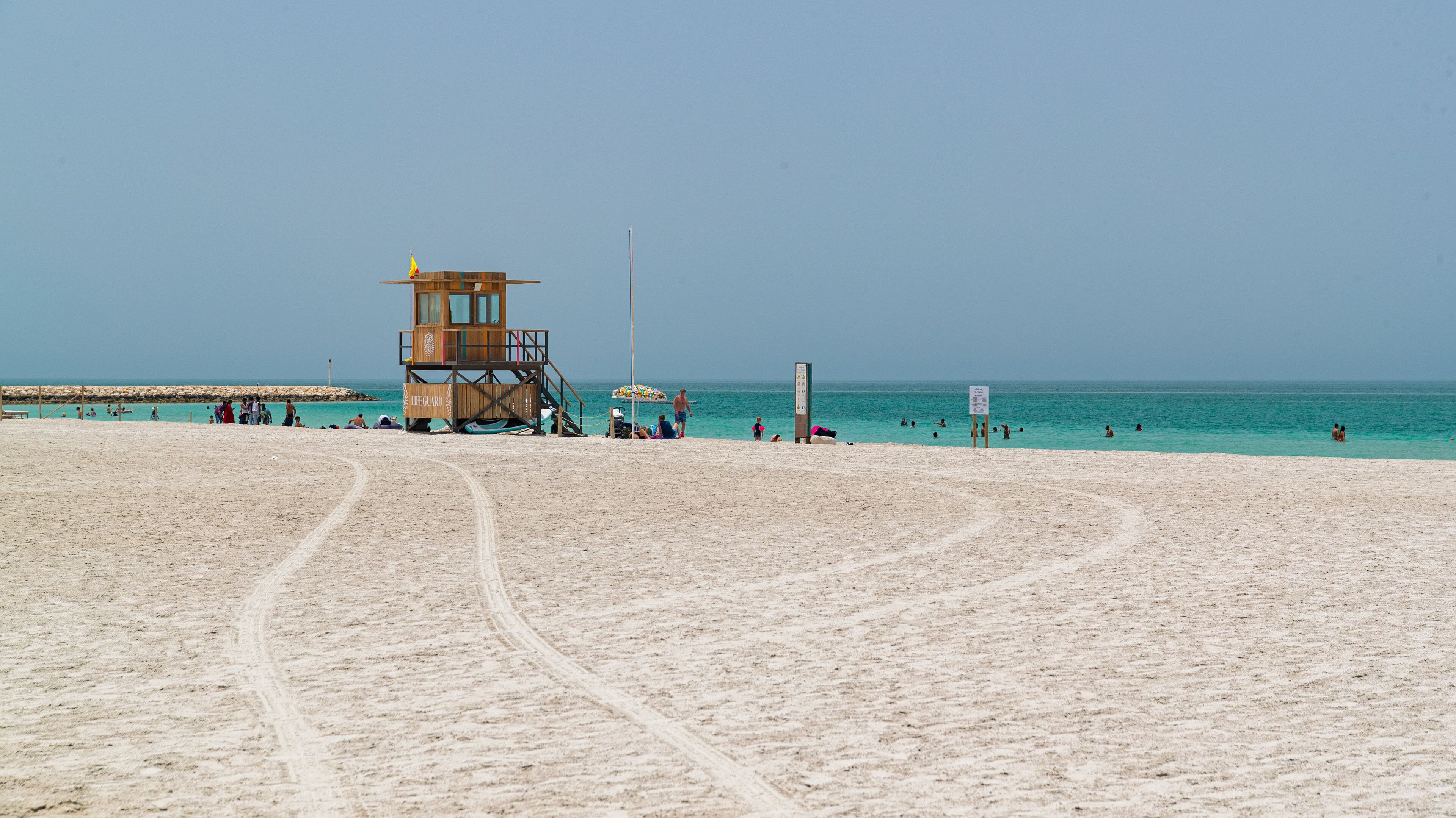 Al Jazaira Beach which includes general coastal views, tropical scenes and a sandy beach