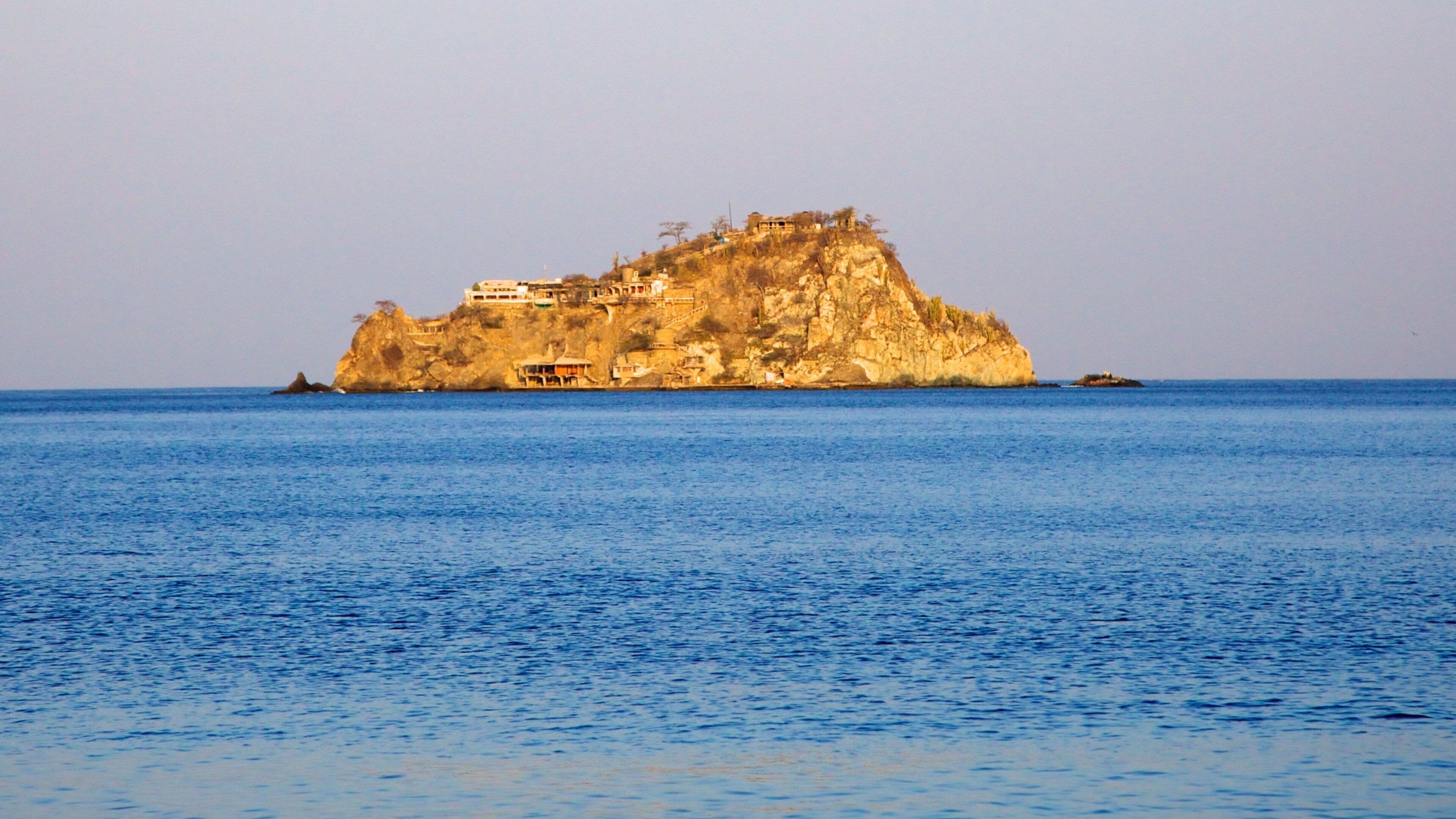 Rodadero Beach featuring general coastal views, landscape views and island images