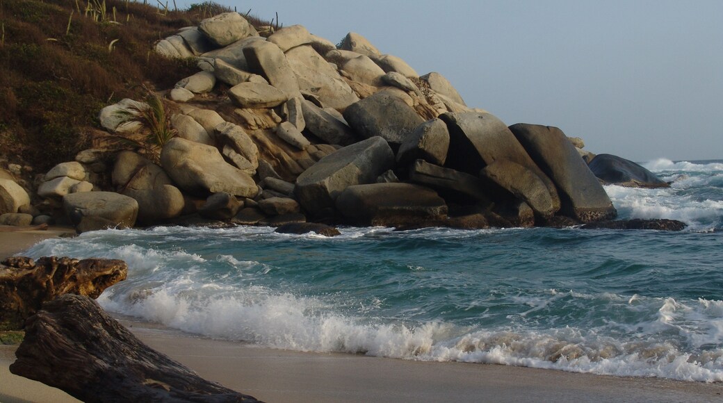 Tayrona National Natural Park showing general coastal views, a sandy beach and rugged coastline