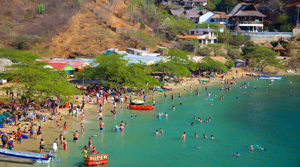 Taganga strand fasiliteter samt kystby, sandstrand og svømming