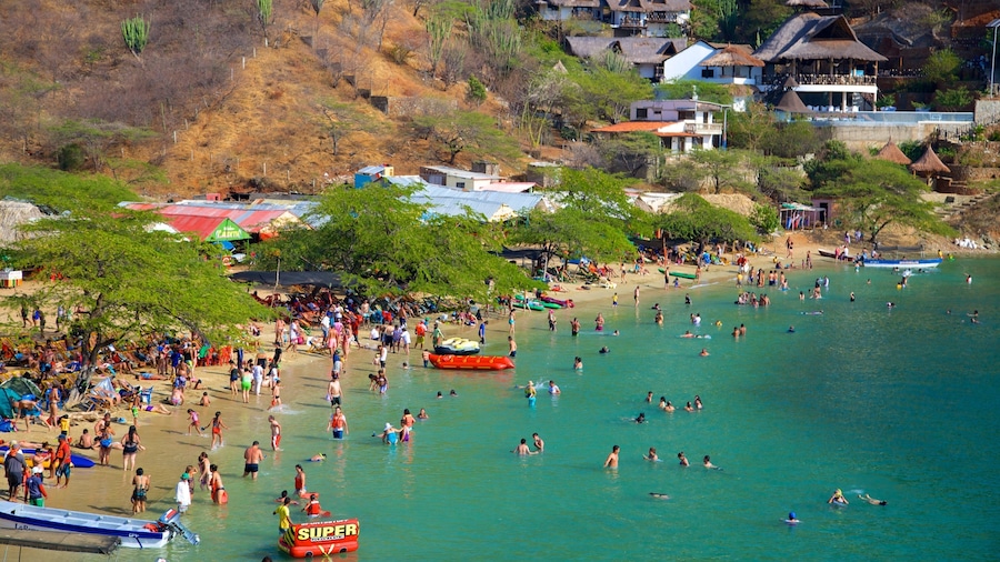 Taganga Beach featuring a coastal town, swimming and a sandy beach