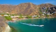 Taganga Beach featuring landscape views, a beach and boating