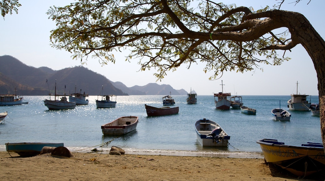 Taganga Beach featuring a beach, a bay or harbor and boating