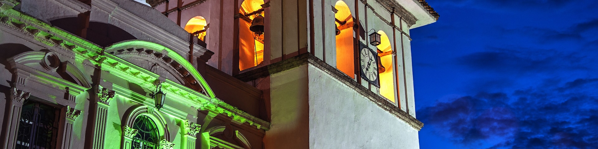 The clock tower in Popayan, Colombia during the blue hour.