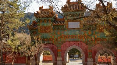 Gate with three arches in park of Putuo Zongcheng temple in China close to Chengde city in Hebei province.