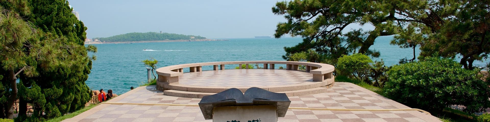 Lu Xun Park featuring outdoor art and a monument