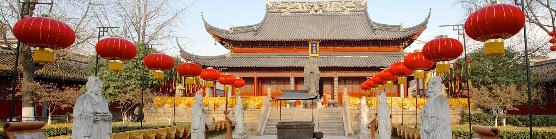 Temple of Confucius which includes a statue or sculpture, a temple or place of worship and religious aspects