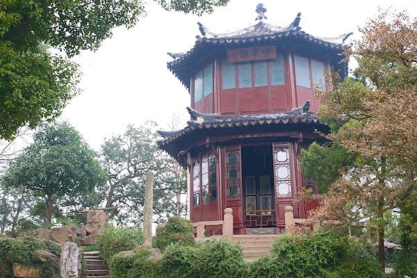 Suzhou showing a temple or place of worship, religious aspects and a park