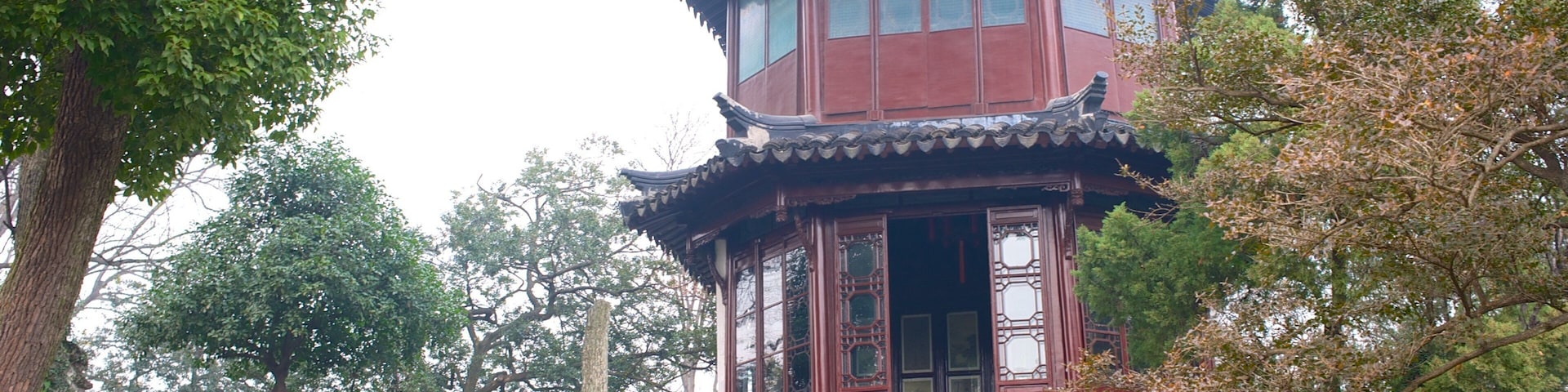 Suzhou showing a temple or place of worship, religious aspects and a park