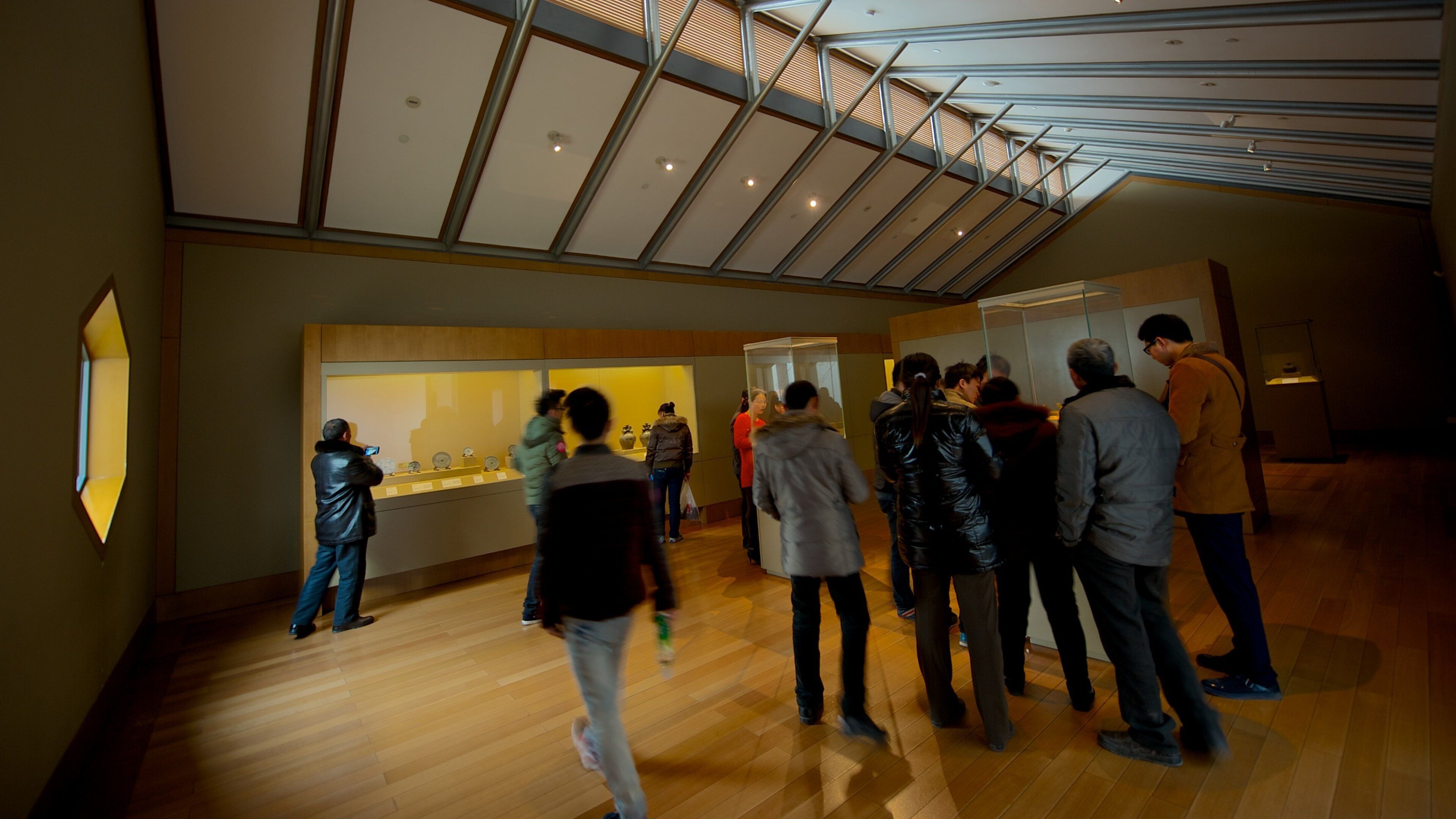 Suzhou Museum which includes interior views as well as a large group of people