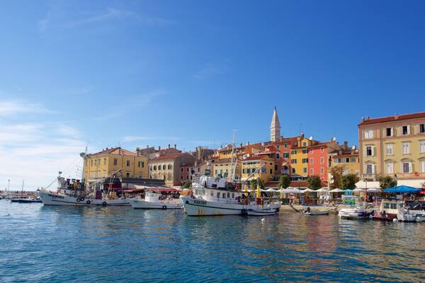 Rovinj Harbour showing a bay or harbour, a coastal town and boating