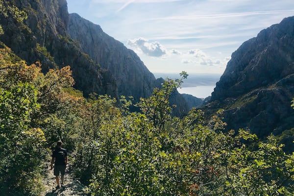 Hiking trail with stunning Adriatic Sea views coming down the mountain