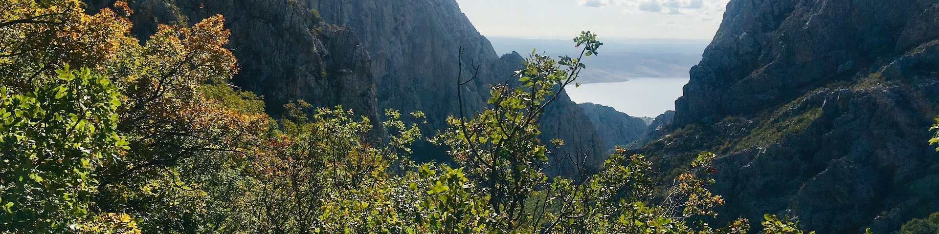 Hiking trail with stunning Adriatic Sea views coming down the mountain
