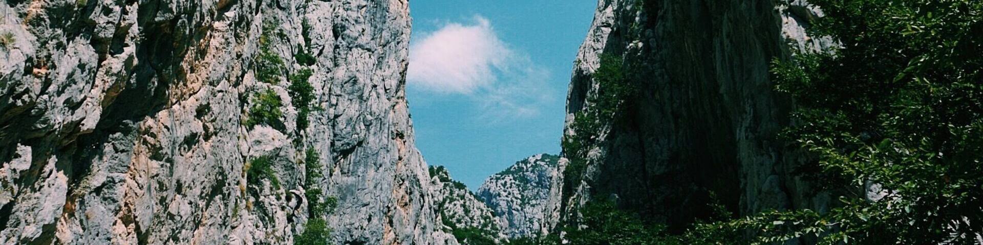 #hiking through gorges in Paklenica National Park, Croatia. We caught the bus from Zadar to here - make sure you take cash to pay at the station as the ATMs are often out of order and the station does not accept card. Try get the bus early as possible, especially in peak season as the sun is scorching and you'll need a lot of water breaks and rest time. There is a super market and a couple of cafes down the road from the national park entrance but pack some snacks and water! Head down to the ocean afterwards to cool off #mountains #croatia #paklenica