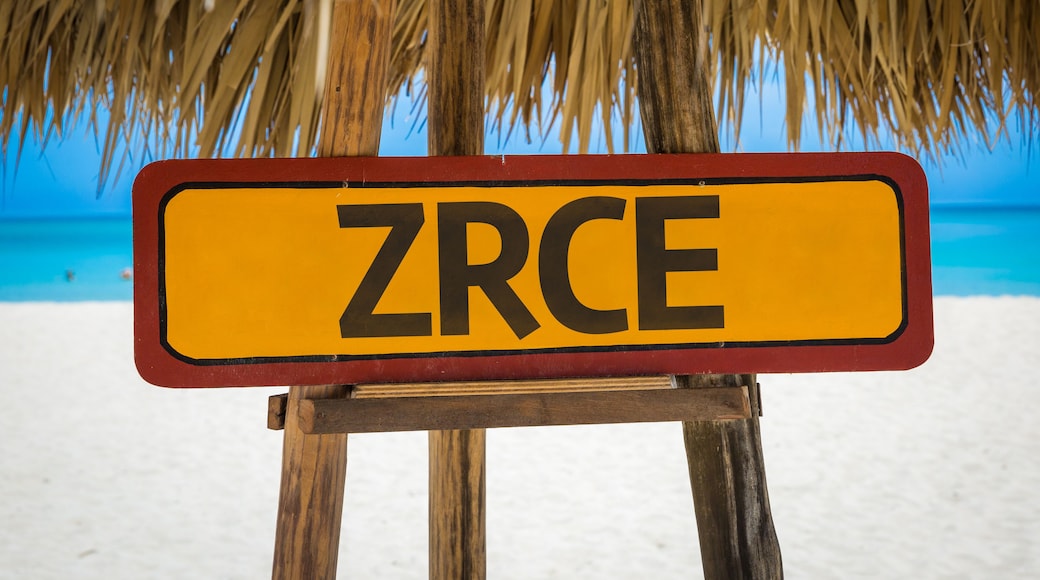 Zrce sign with beach background
