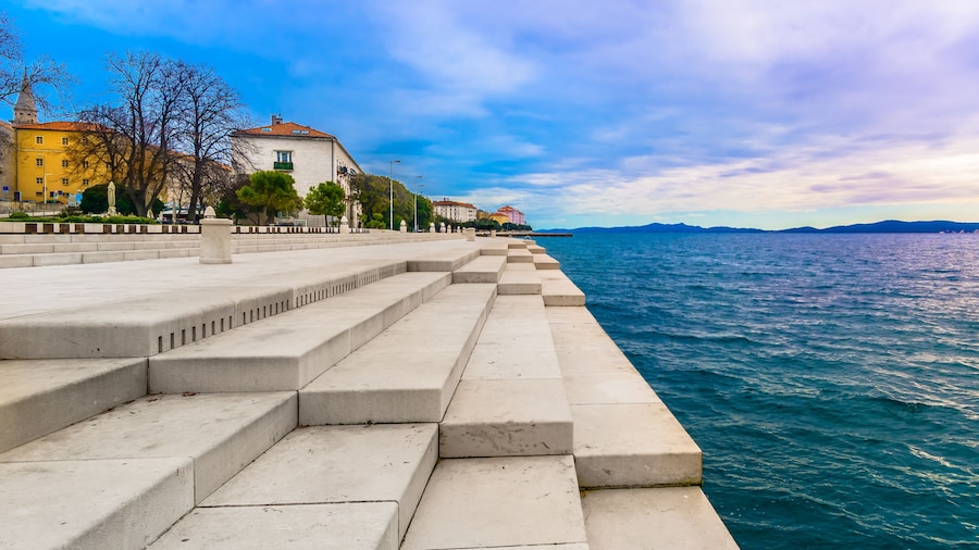 Zadar coastline Sea Organ. / Scenic view at coastal town Zadar and famous landmark on city promenade, Sea Organ, Croatia Europe.