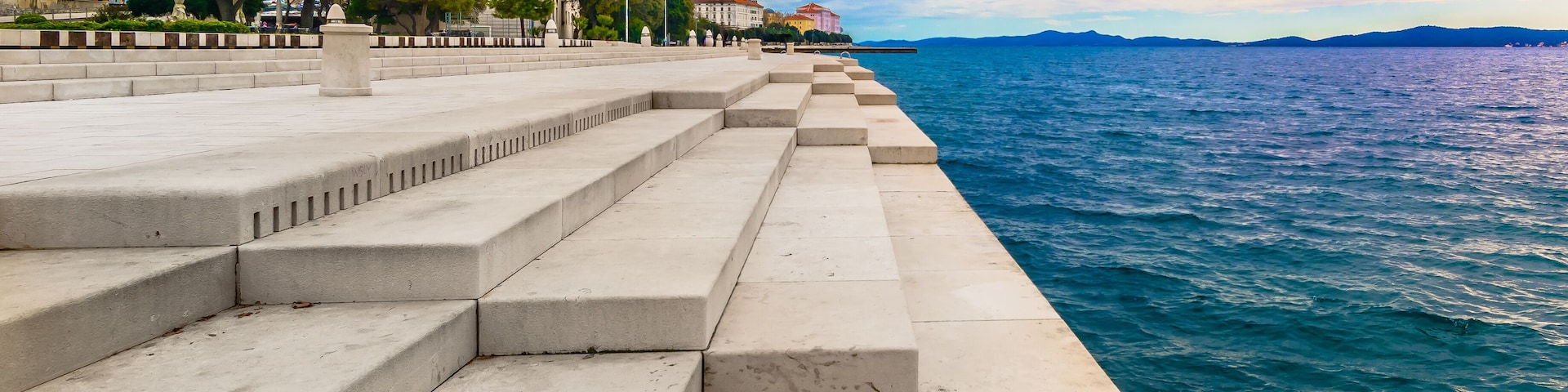 Zadar coastline Sea Organ. / Scenic view at coastal town Zadar and famous landmark on city promenade, Sea Organ, Croatia Europe.