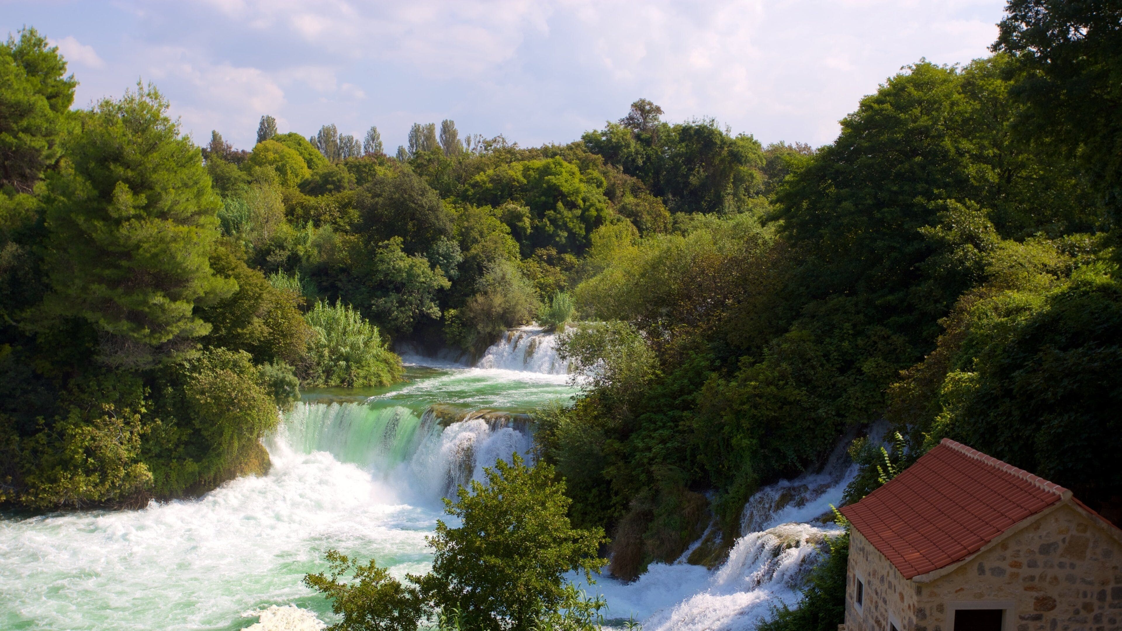 Krka National Park featuring rapids and a river or creek