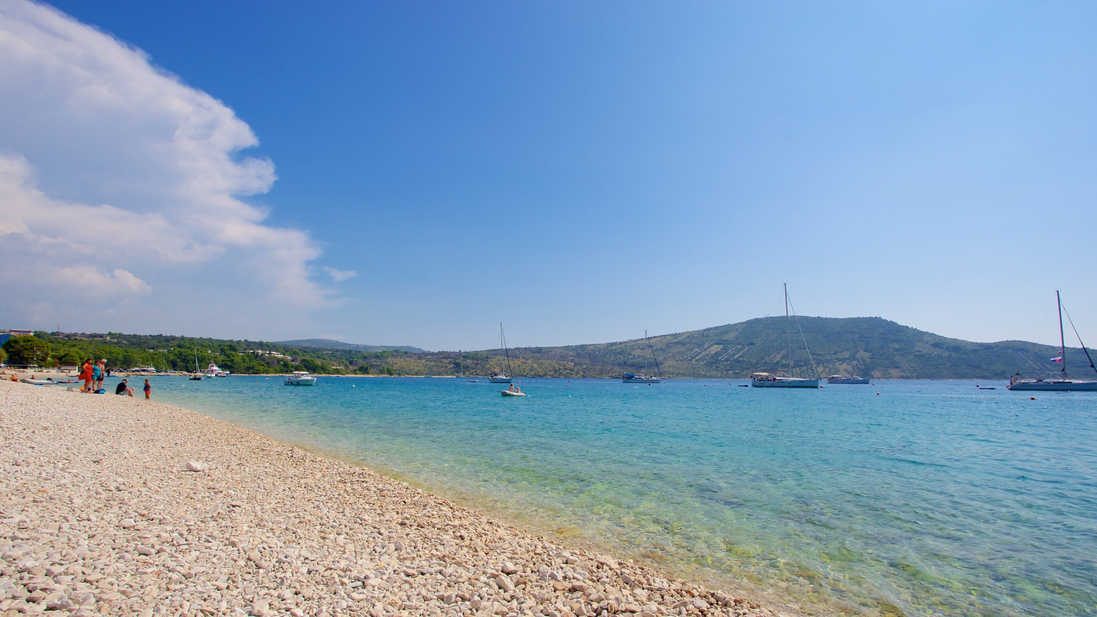 Primosten Beach showing a pebble beach and sailing