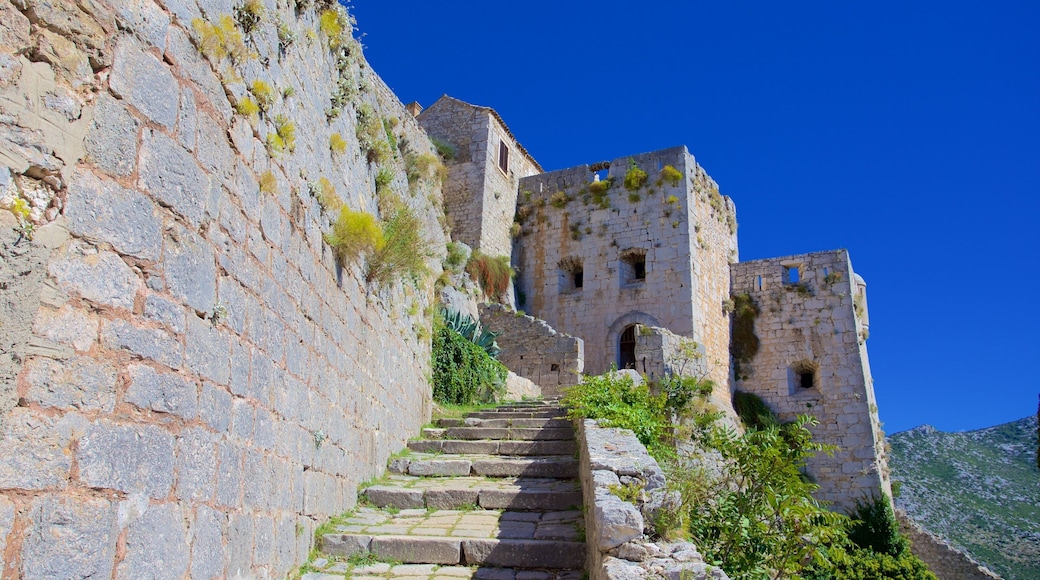 Klis Fortress which includes building ruins and heritage elements
