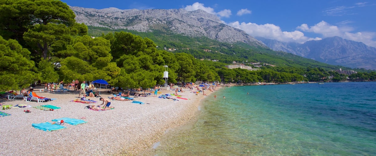 Brela Beach which includes a pebble beach and mountains