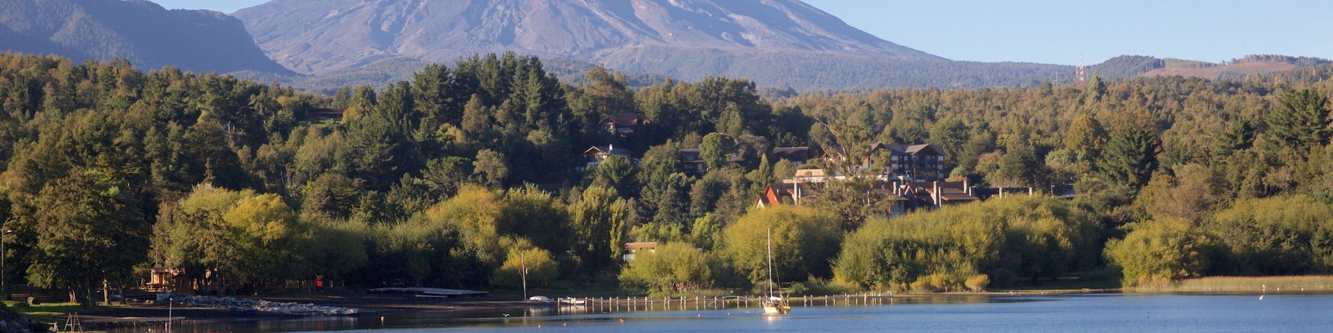La Poza featuring mountains, a lake or waterhole and forests