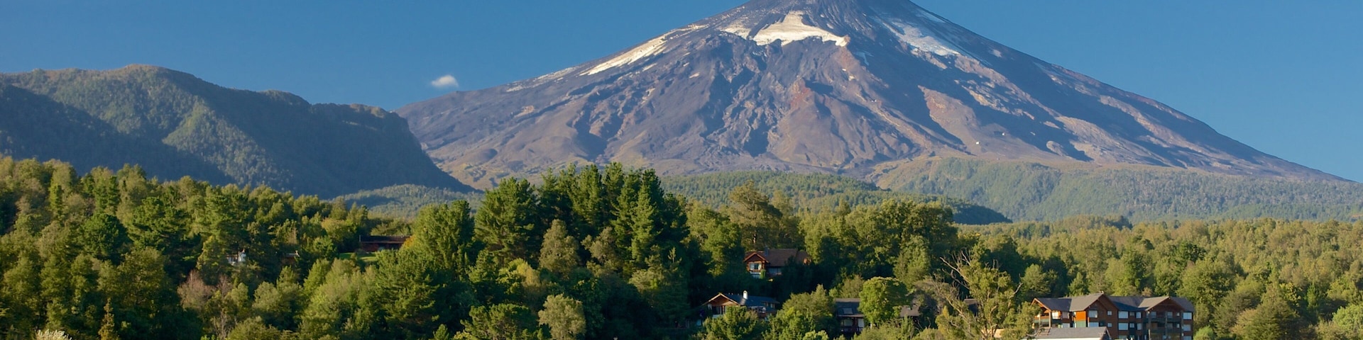 La Poza showing a lake or waterhole, mountains and forests