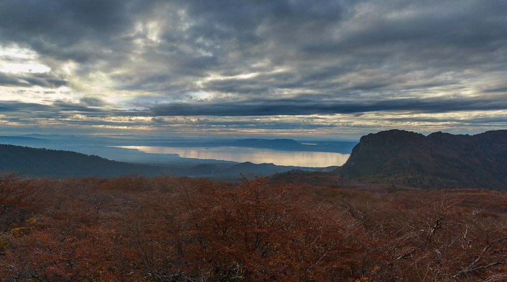 Villarrica National Park featuring tranquil scenes and a sunset