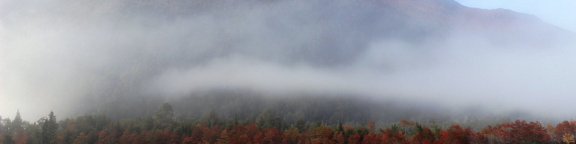 Caption---- fog over Todos Los Santos Lake, Puerto Varas, Los Lagos region, Chile