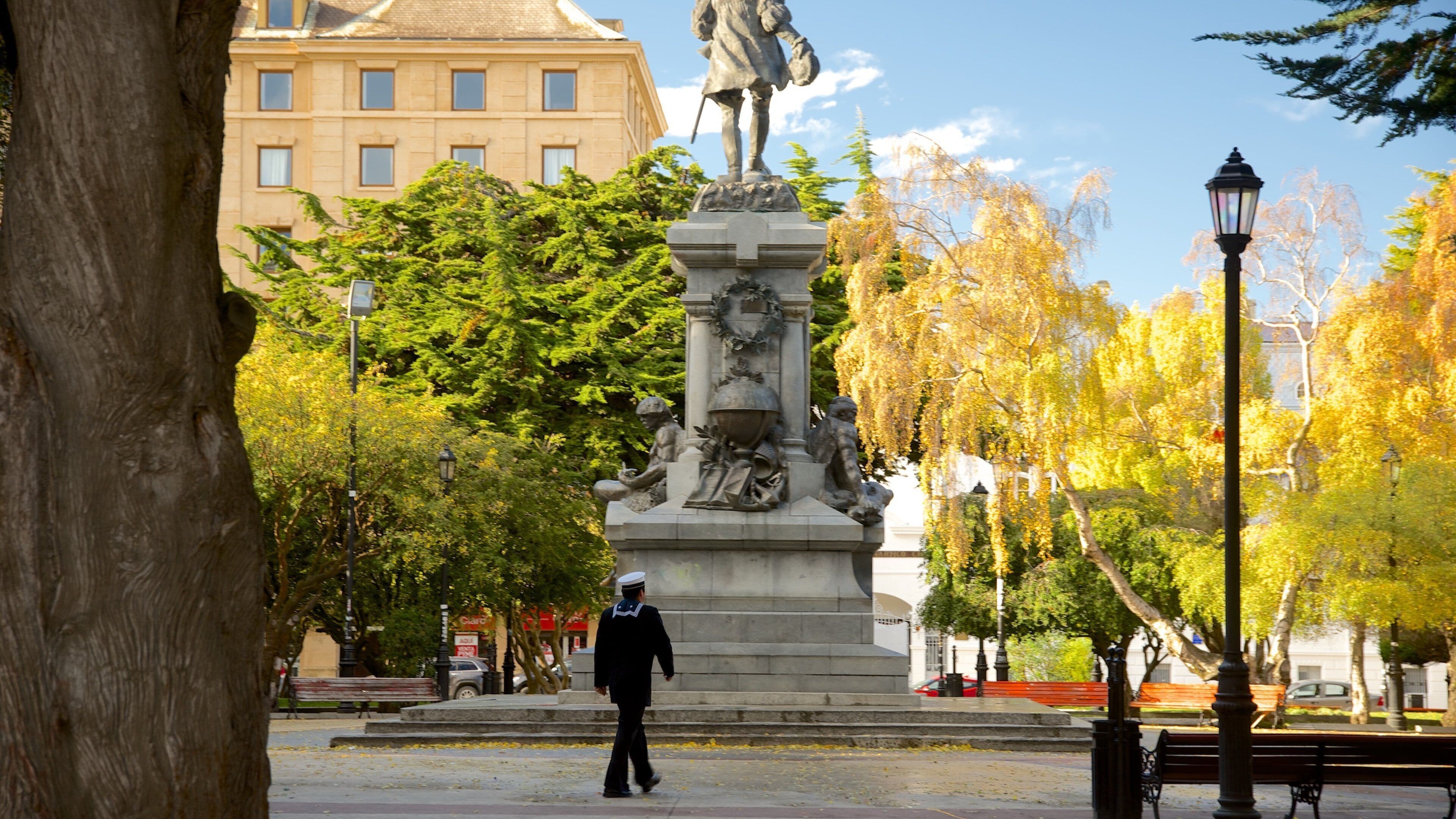 Plaza Munoz Gamero featuring a statue or sculpture, a garden and a square or plaza