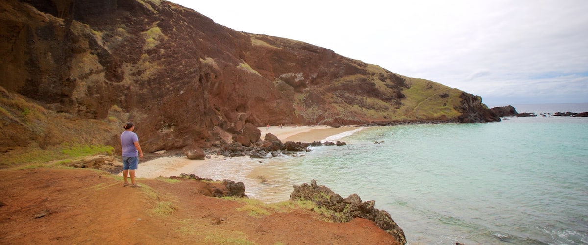 Ovahe Beach featuring general coastal views as well as an individual male