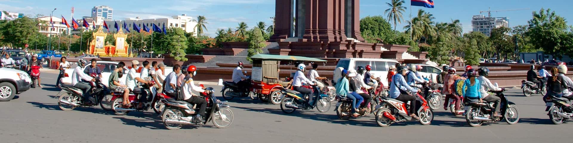Independence Monument featuring a monument and motorbike riding