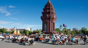 Independence Monument featuring a monument and motorbike riding