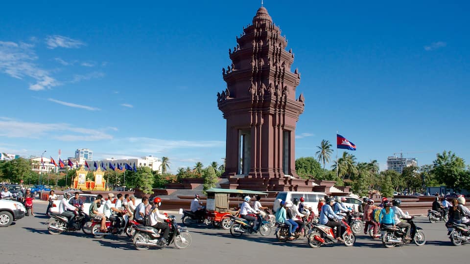 Independence Monument featuring a monument and motorbike riding