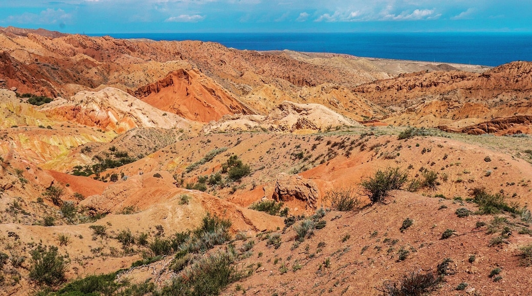 The Shazka Canyon (The Fairy Tale Canyon) in Kyrgyzstan. In the background you can see Issyk Kul, the world's tenth largest lake, which can be translated into "The Warm Lake"; it never freezes.
