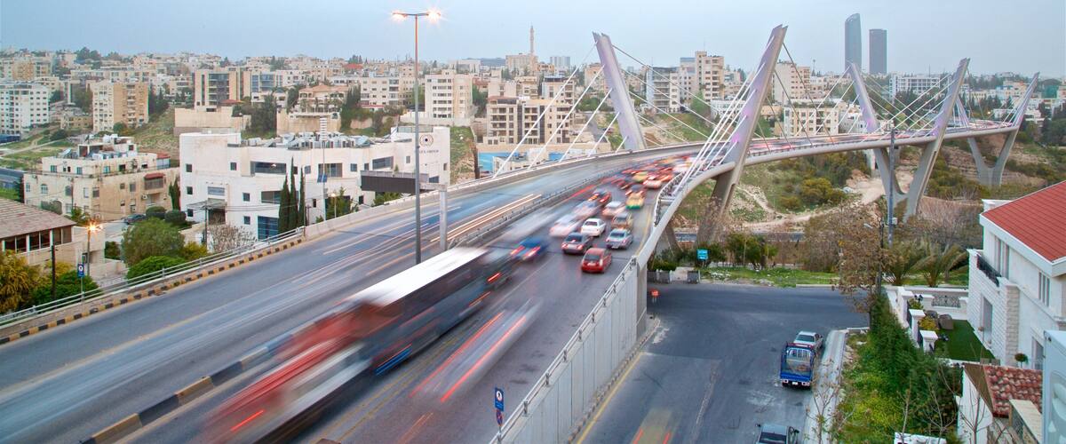 Abdoun Bridge showing landscape views, a bridge and a city