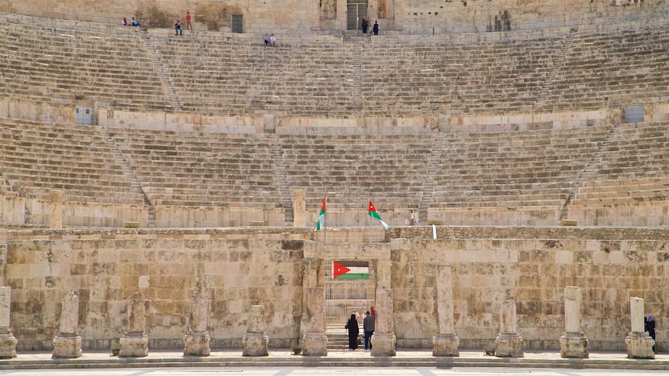 Amman Roman Theater which includes heritage architecture and theater scenes as well as a couple