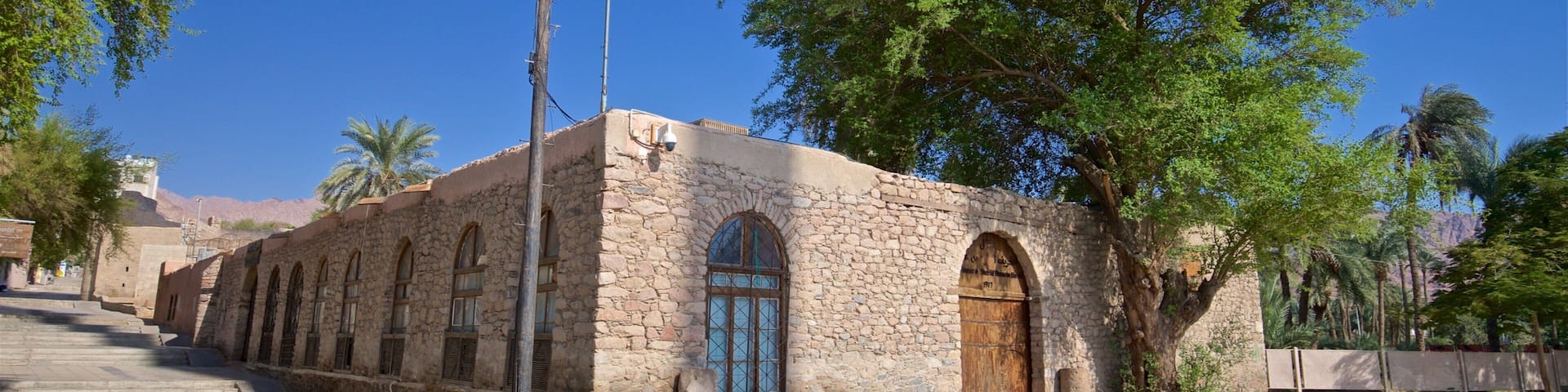 Aqaba Fort featuring heritage elements and a house